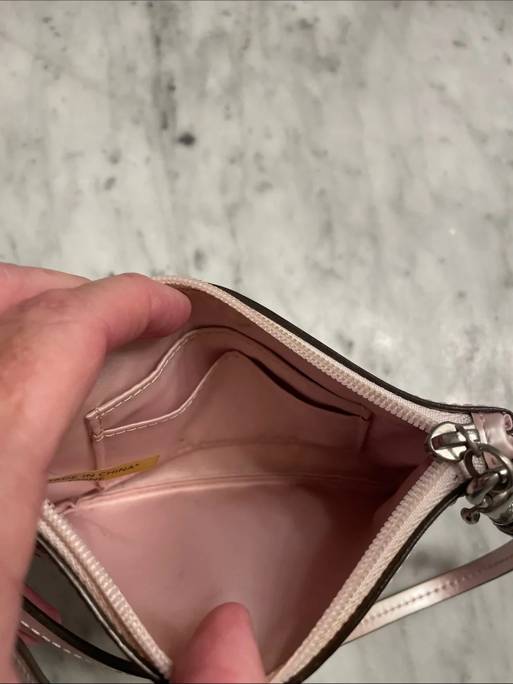 Super cute Coach Laser-Cut light Pink Metallic Wristlet Clutch
